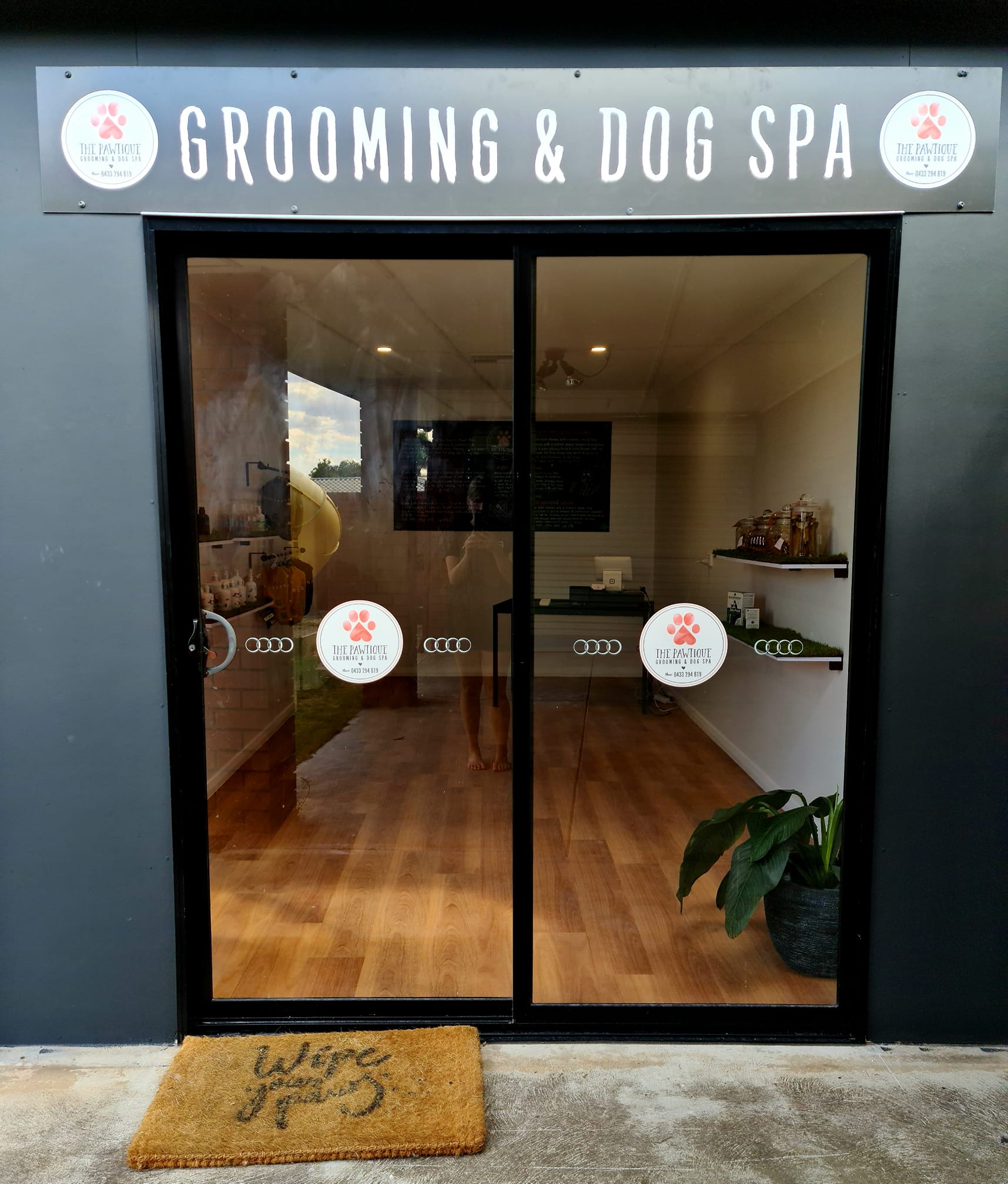 The MyKindCoats grooming studio entrance on Prenzlauer Allee, Berlin